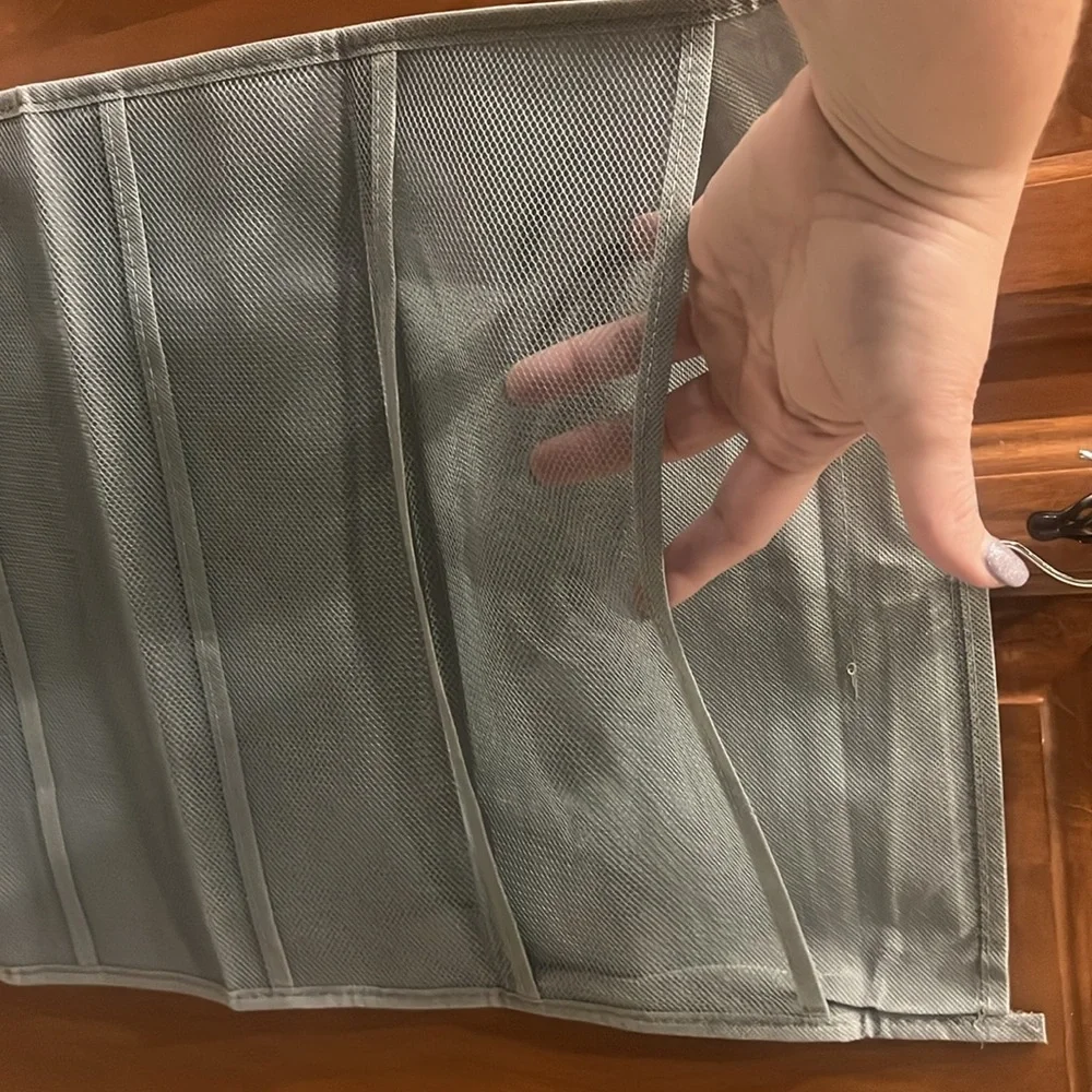 Gray Hanging organizer for closet.